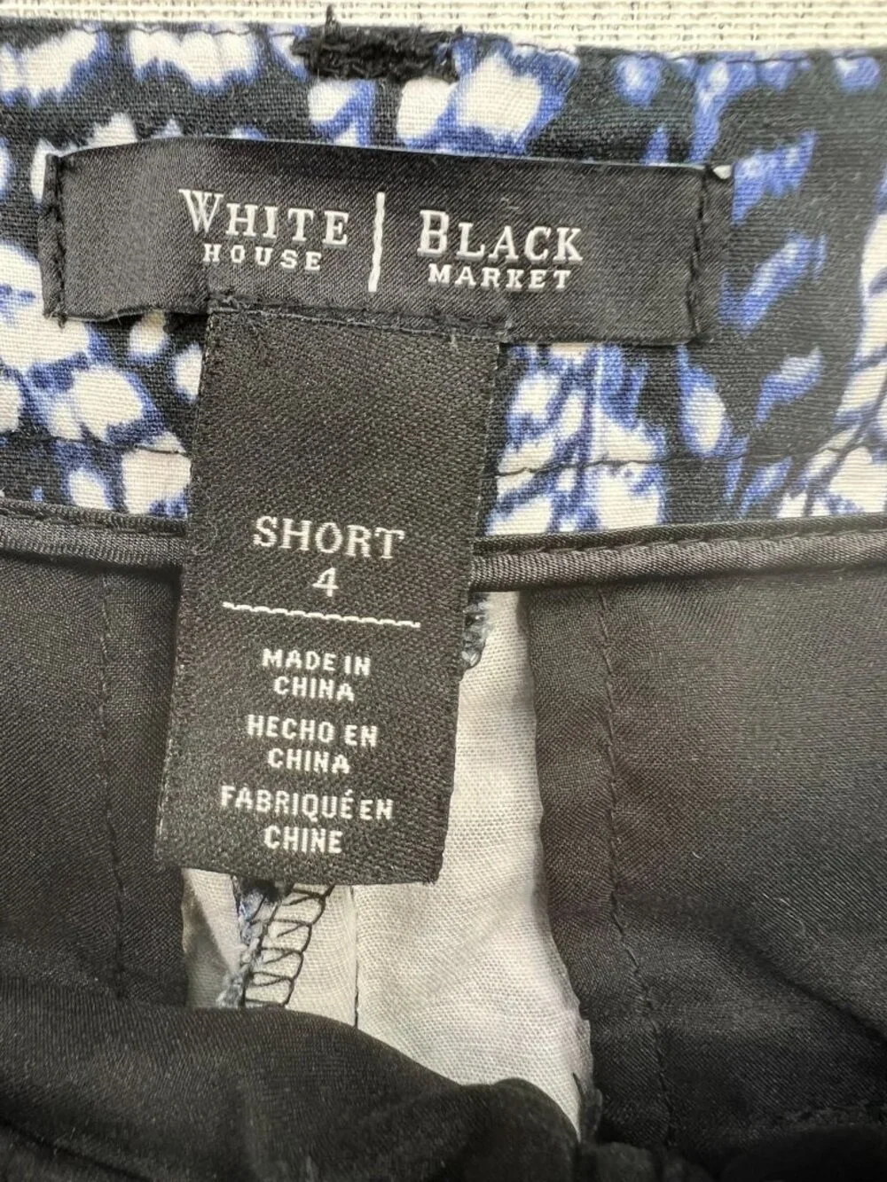 White House Black Market Womens Chino Shorts Flat Front Sz 4 Multi Feather Print